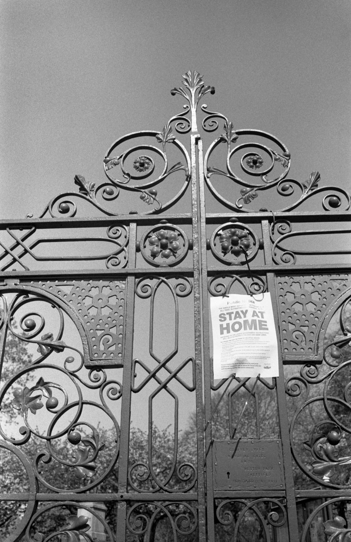 Park Gate with Stay at Home sign